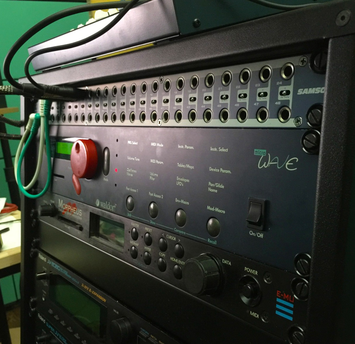 Image of two Roland JV-2080 Synthesizers and an E-MU Morpheus